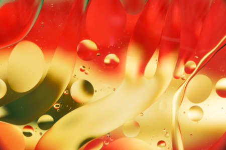 mix oil and water, color background with soft defocusing, macro abstractの写真素材