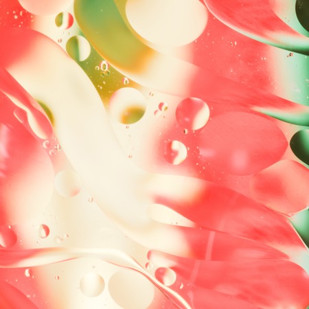 mix oil and water, color background with soft defocusing, macro abstract