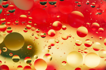 mix oil and water, color background with soft defocusing, macro abstractの写真素材