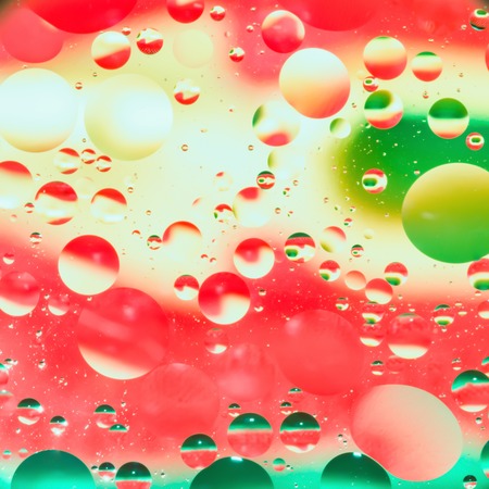 mix oil and water, color background with soft defocusing, macro abstractの写真素材