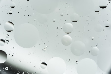 mix oil and water, color background with soft defocusing, macro abstractの写真素材