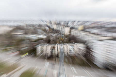 Creative blur with zoom effect. Abstract image of an hauses city. Space for lettering or designの写真素材