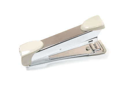 The stapler is a metallic gray color の写真素材