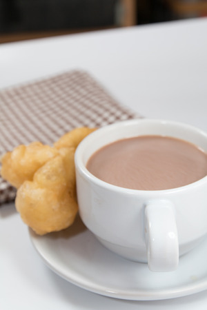 Cocoa drink and doughstickの写真素材