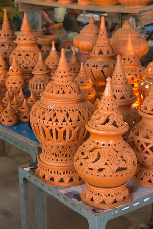 Rustic handmade ceramic clay brown terracotta cups souvenirs at street handicraft marketの写真素材