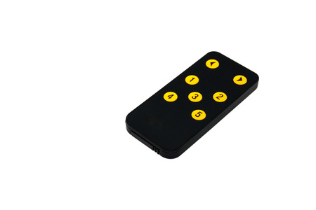 tv remote control keypad black on white isolatedの写真素材