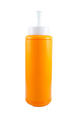 Plastic bottle of Ketchup sauce isolated over white backgroundの写真素材