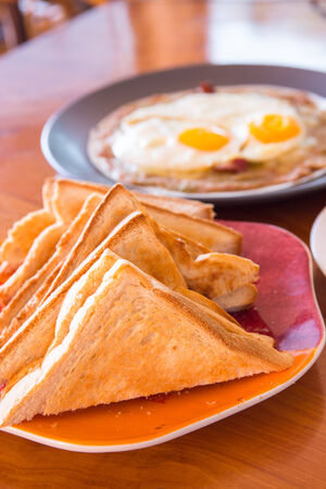 bread and fried eggの写真素材
