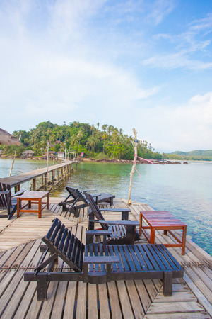 chairs wood with the island viewの写真素材