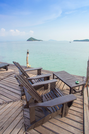 chairs wood with the island viewの写真素材