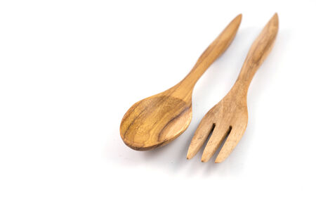 Wooden spoon on White backgroundの写真素材