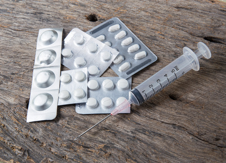 Medicine capsule with syringeの写真素材