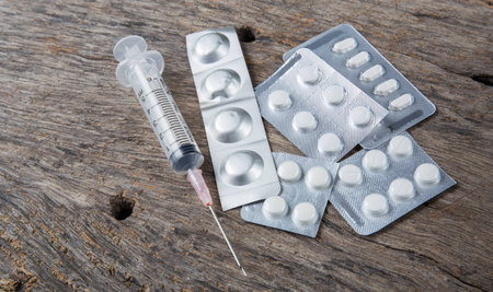 Medicine capsule with syringeの写真素材
