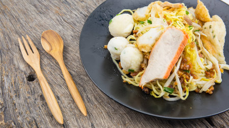 wheat noodles on wooden tableの写真素材