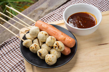 The grilled sausage and meat ball in Thai styleの写真素材