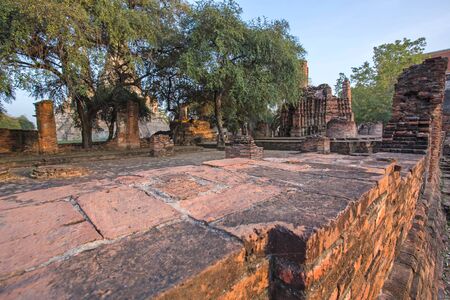 Asian religion architecture. Ancient Buddhist pagoda ruins, Thailand travel landscape and destinationsの写真素材