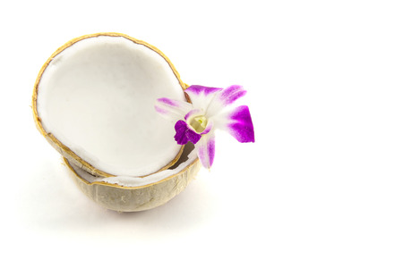 Two coconut one of which is splitの写真素材