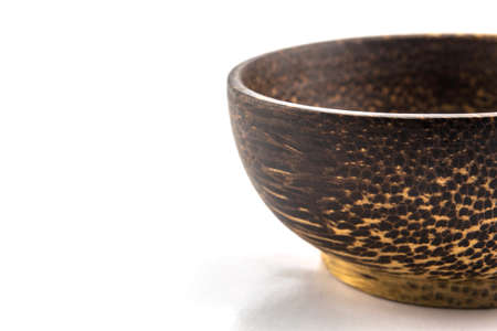 Wooden bowl. Isolated on white backgroundの写真素材