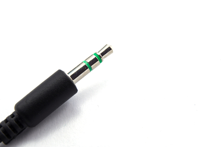 Macro of audio jack isolated on white background