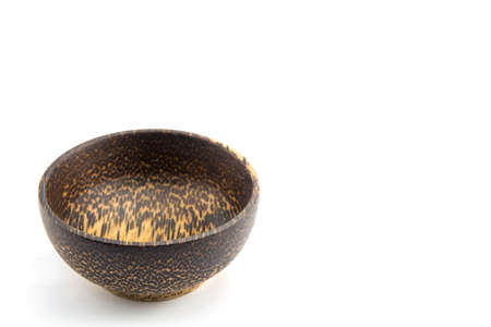 Wooden bowl. Isolated on white backgroundの写真素材