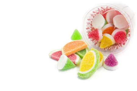 candies. jelly candies in plate on a background. jelly candies on white background.の写真素材
