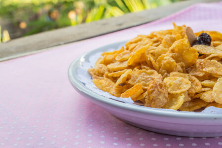 Cornflakes (detailed top view) on tableの写真素材