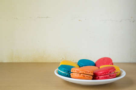 French macaroons on plate, with vintage pastel filteredの写真素材