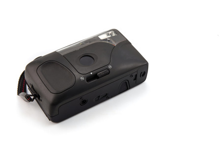 Digital compact photo camera isolated on white background