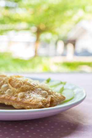 Corn pie with dish on table.の写真素材