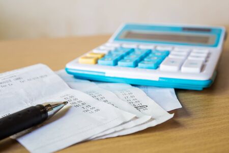 Close up of receipt paper and caculator, paymentの写真素材