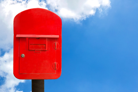 Red post box and sky, clipping pathの写真素材
