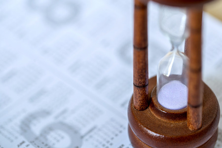 sandglass on calendar timing of diaryの写真素材
