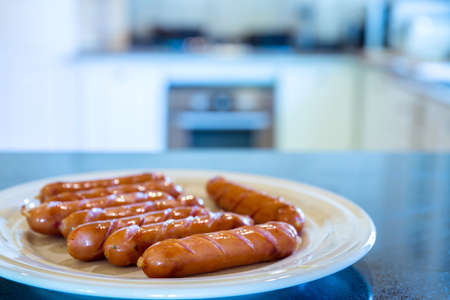 Grilled sausages on tableの写真素材