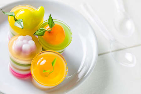 sweet fruit jelly laminate on a wood backgroundの写真素材