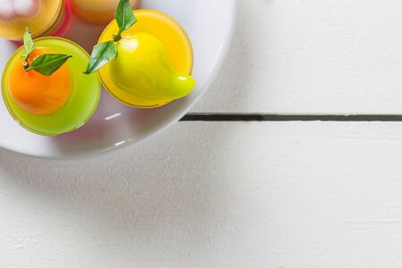 sweet fruit jelly laminate on a wood backgroundの写真素材