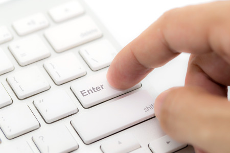 Hands of businessman with a computer keyboard.