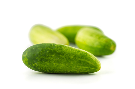 Cucumber and slices collection isolated on white backgroundの写真素材