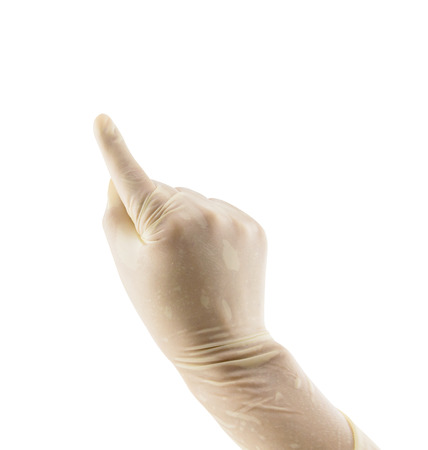 Doctor hand in sterile gloves showing sign, isolated on white backgroundの写真素材
