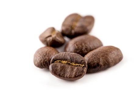 Coffee beans isolated on white background, closeup, macroの写真素材