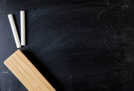 close up of a black dirty chalkboard, ecucation and back to school conceptの写真素材
