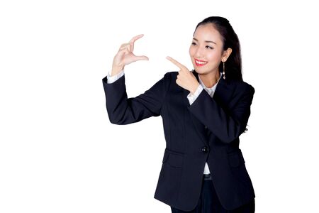 beautiful young asia businesswoman with gesture pointing somethingの写真素材