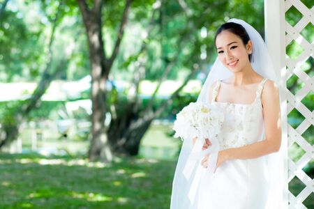 Asian bride at outdoor in a morning.の写真素材