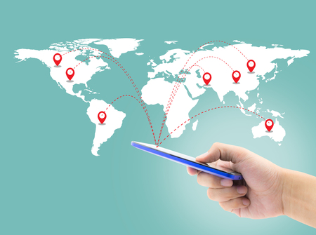 Smart man holding telephone with world social media network connection,の写真素材