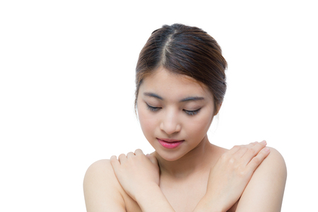 Beautiful girl with makeup, youth and skin care concept / attractive asian girl isolated on white backgroundの写真素材