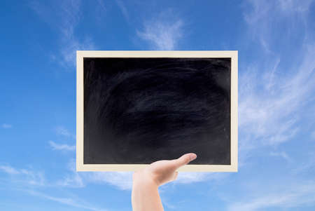chalkboard space can be used for on text your. and blue sky background.の写真素材
