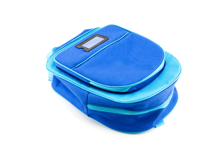 Blue backpack with school supplies isolated on white background, Stationery concept.の写真素材