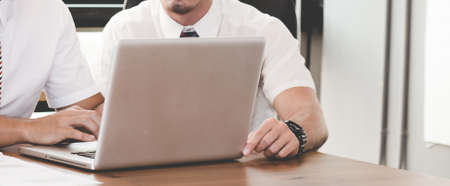 Closeup business people talking about the term of their business relationship, business meeting concept.の写真素材