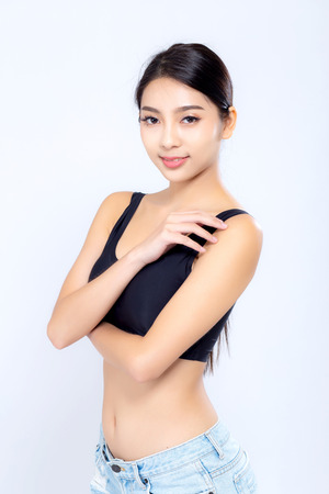 Portrait young asian woman smiling beautiful body diet with fit isolated on white background, model girl weight slim with cellulite or calories, health and wellness concept.の写真素材
