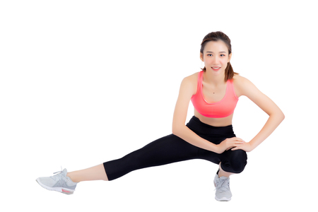 Beautiful portrait young asian woman stretching exercise isolated on white background, fitness sport girl aerobic with smile happy, female workout, health concept.の写真素材