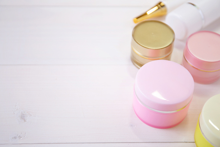 cosmetic and skin care product on white wood table, beauty with treatment cream and moisturizing on wooden desk, health and wellness concept.の写真素材